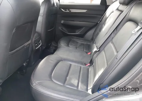 2021 Mazda Cx-5 Grand Touring z USA, uszkodzony, nr VIN JM3KFBDM5M0469257